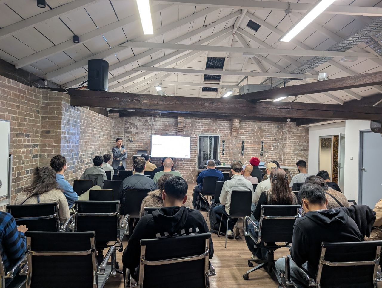 Tony Huang from TiDB presenting to attendees at the 02Ship Sydney meetup, July 8 2026