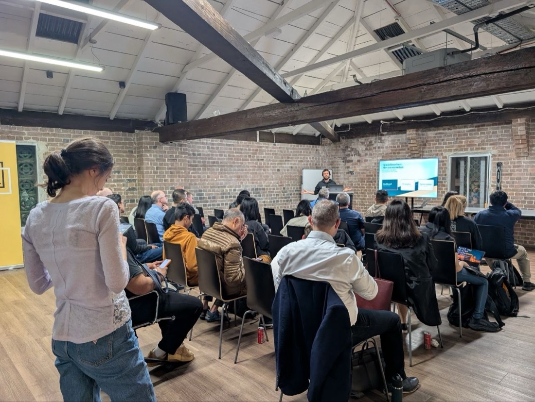 Juan presenting his Claude and Supabase dashboard talk to a full room at the 02Ship Sydney meetup, Haymarket HQ, September 15 2026
